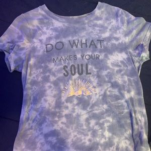 A medium grey short sleeve tie dye shirt.